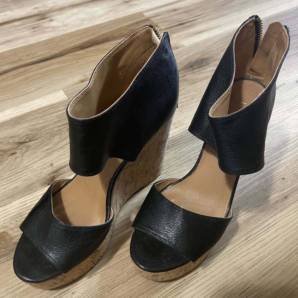 These wedges are in like new condition.I wore them one time!